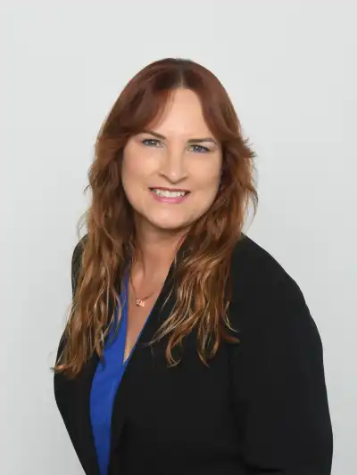 Photo of a woman wearing a black jacket